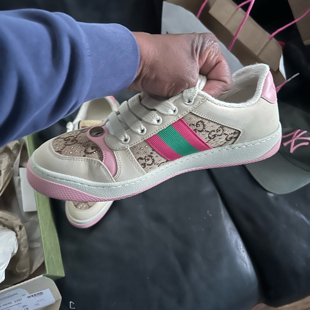 Gucci women’s Cream Sneakers with Pink and Green Web Stripes
